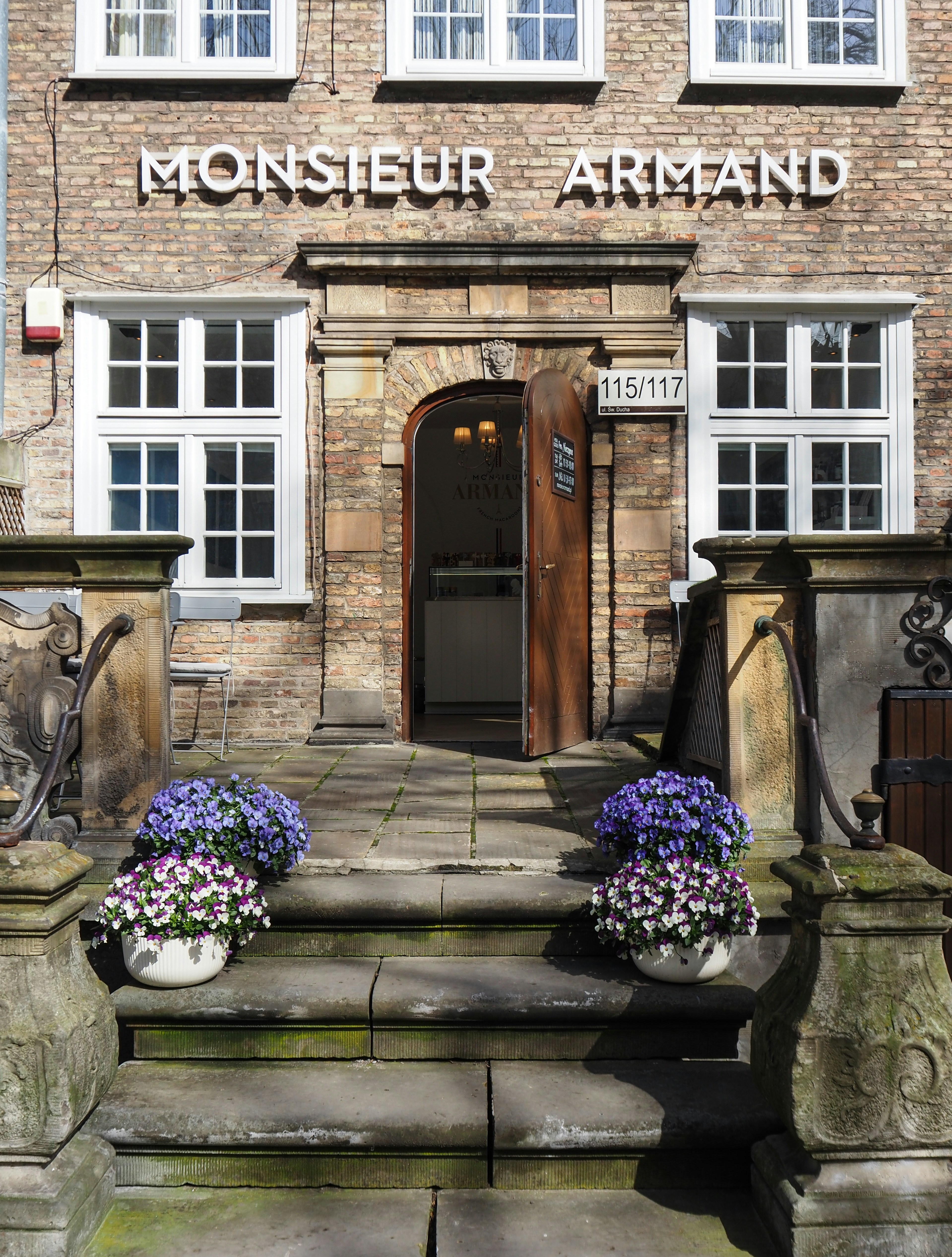 woman wearing yellow long-sleeved dress under white clouds and blue sky during daytime
