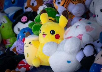 a bunch of stuffed animals that are on a table
