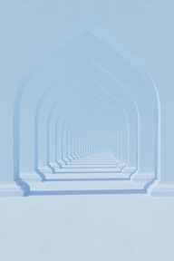 a row of arches in the middle of a room
