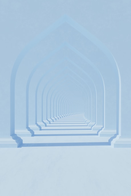 a row of arches in the middle of a room