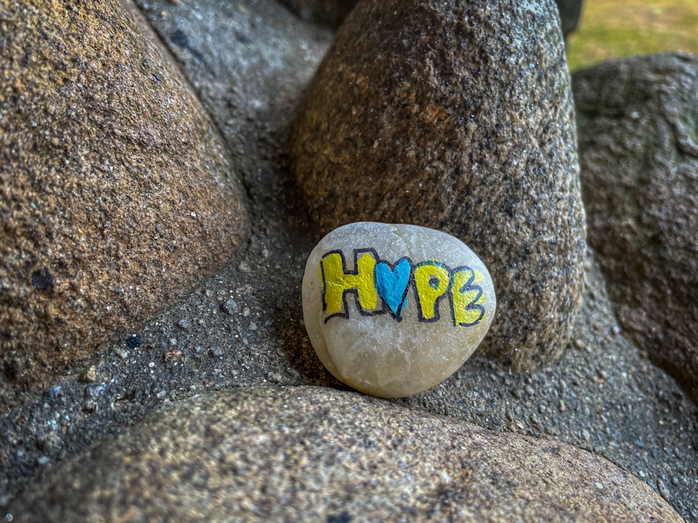 a rock with the word hope painted on it