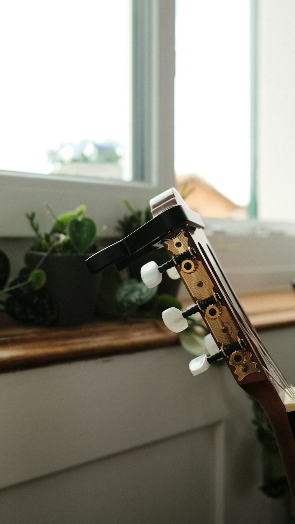 a close up of a violin on a table