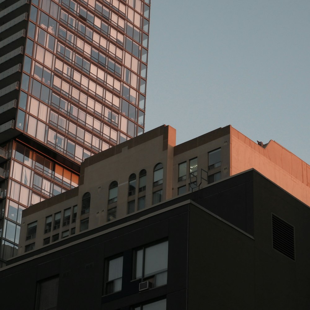 a tall building with a clock on the top of it