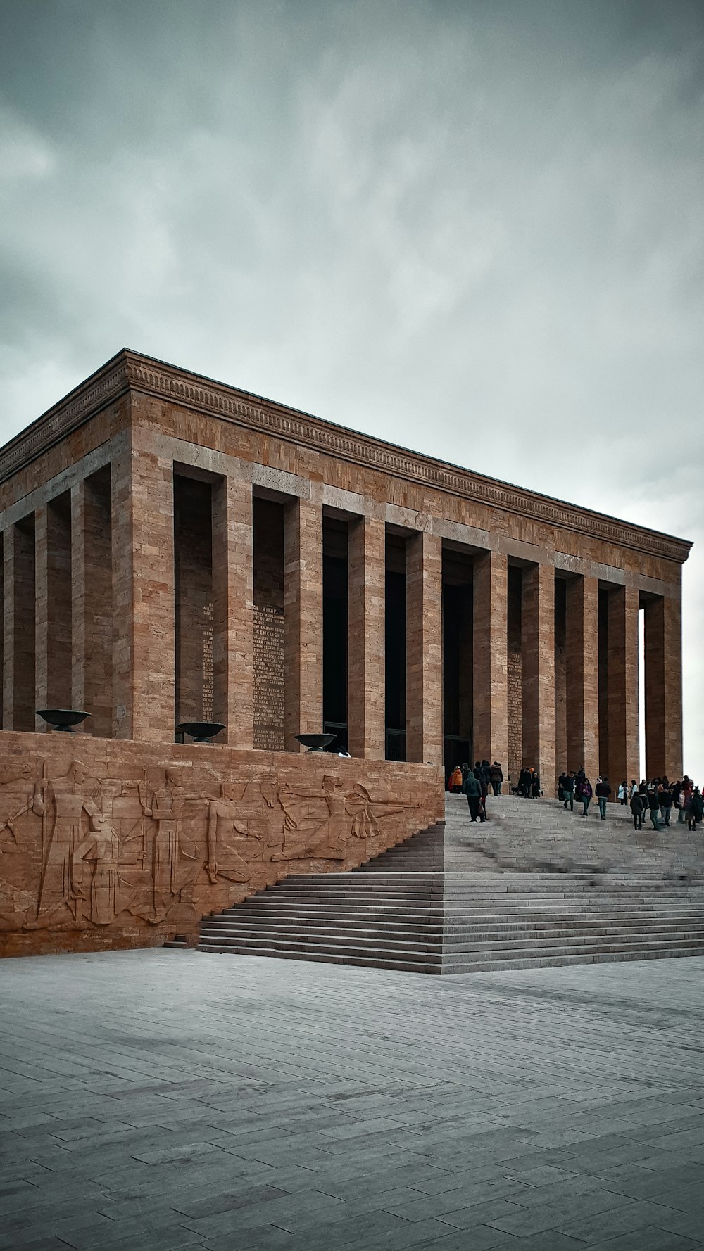 a very large building with some steps in front of it