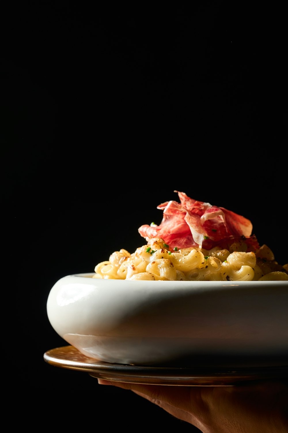 a white plate topped with macaroni and cheese