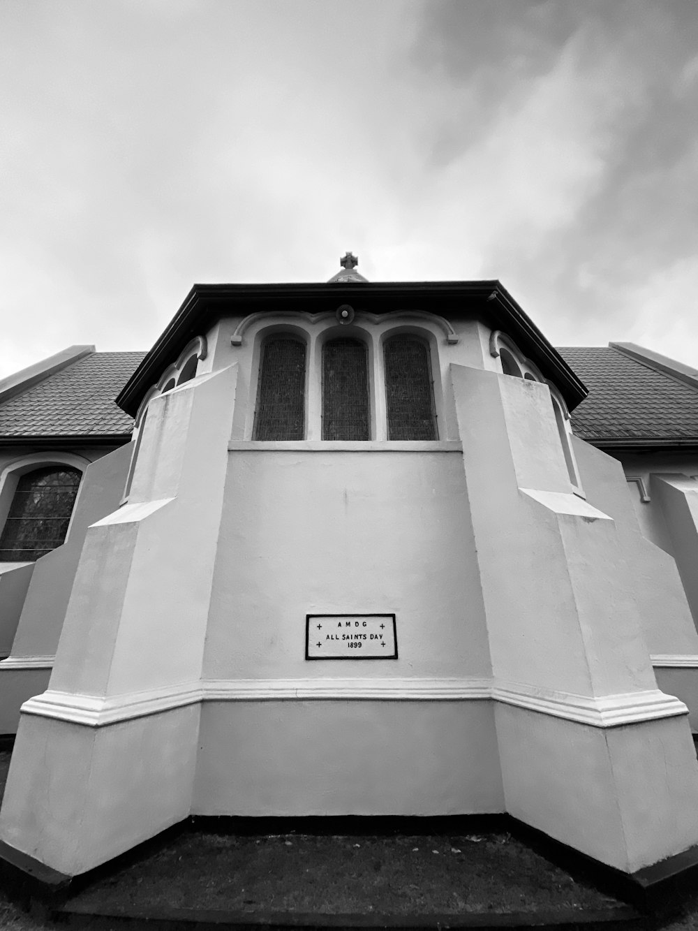 a black and white photo of a church