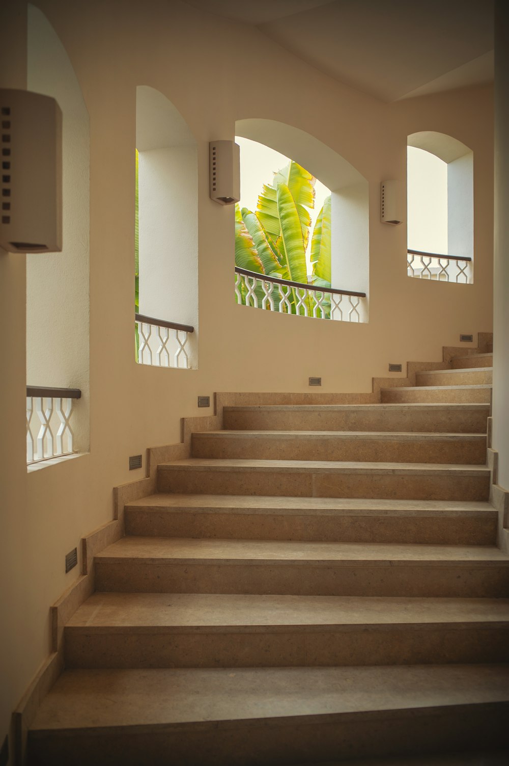 a set of stairs leading up to a balcony