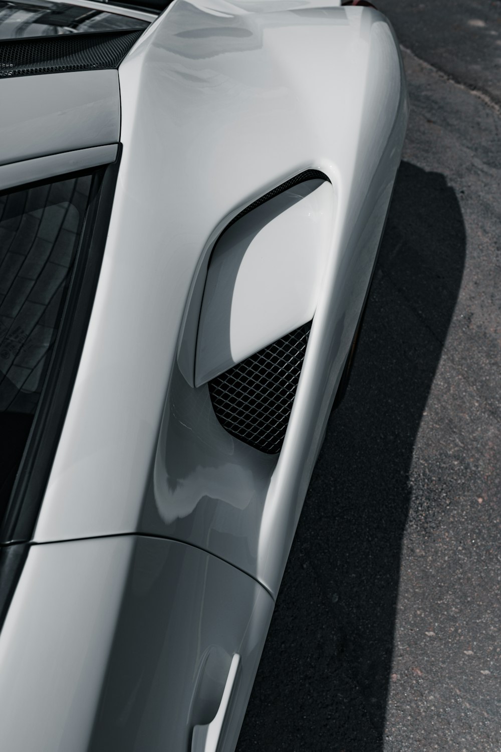 a close up of the front of a sports car