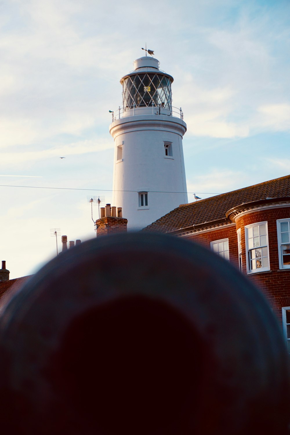 a view of a lighthouse from a distance