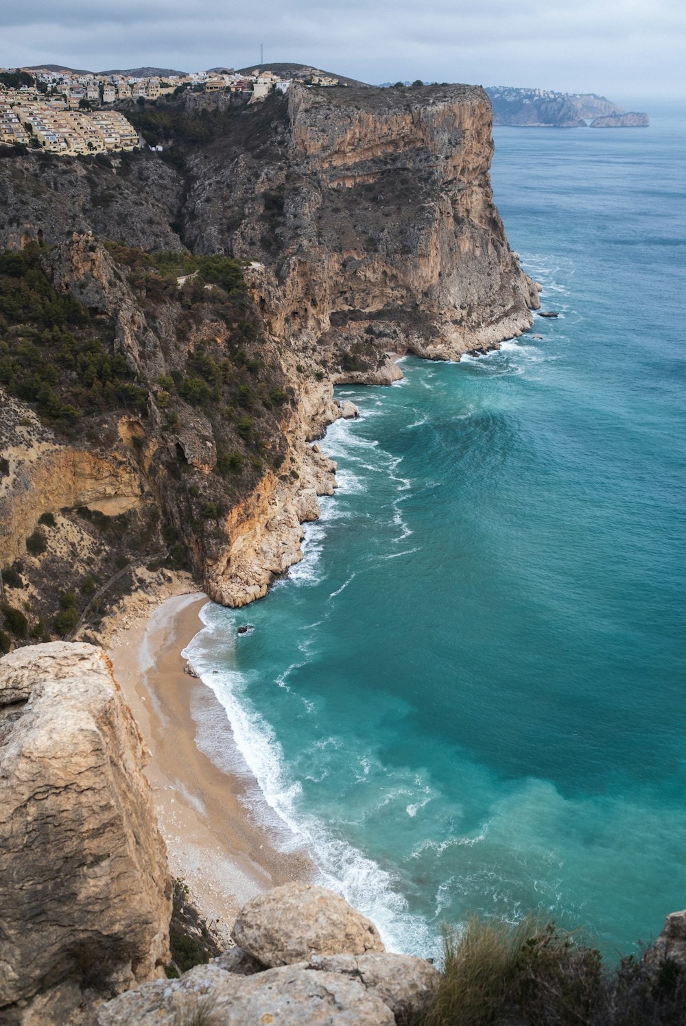 a view of the ocean from a cliff