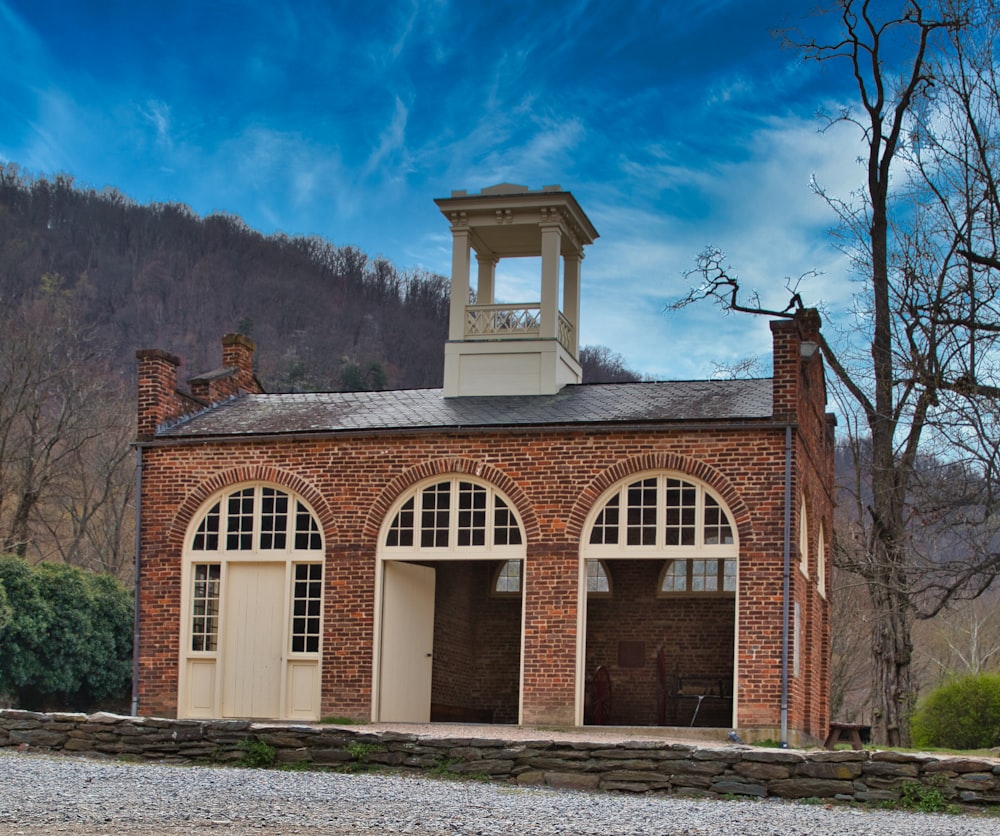 a brick building with a clock tower on top of it