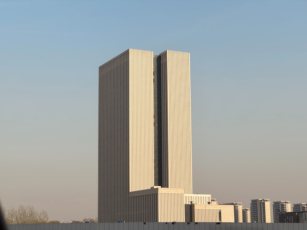 a tall building with a clock on the side of it