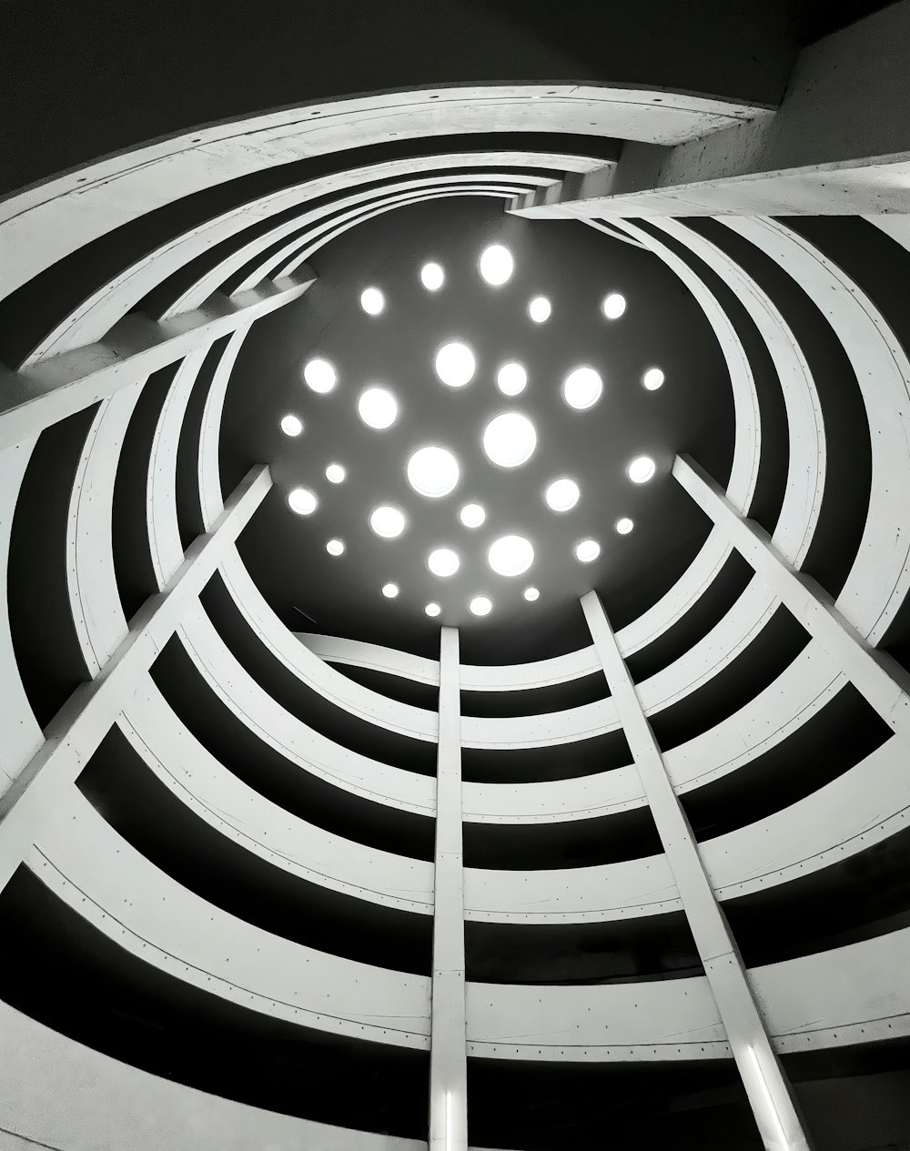 a black and white photo of a circular structure
