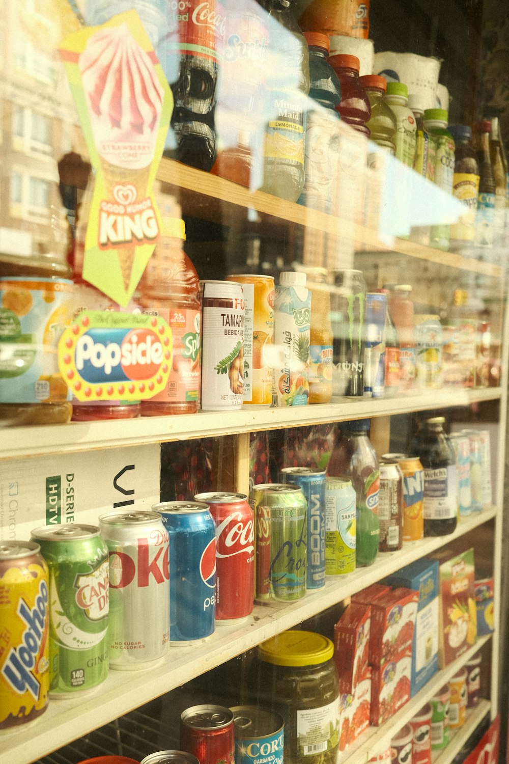 a store filled with lots of different types of soda