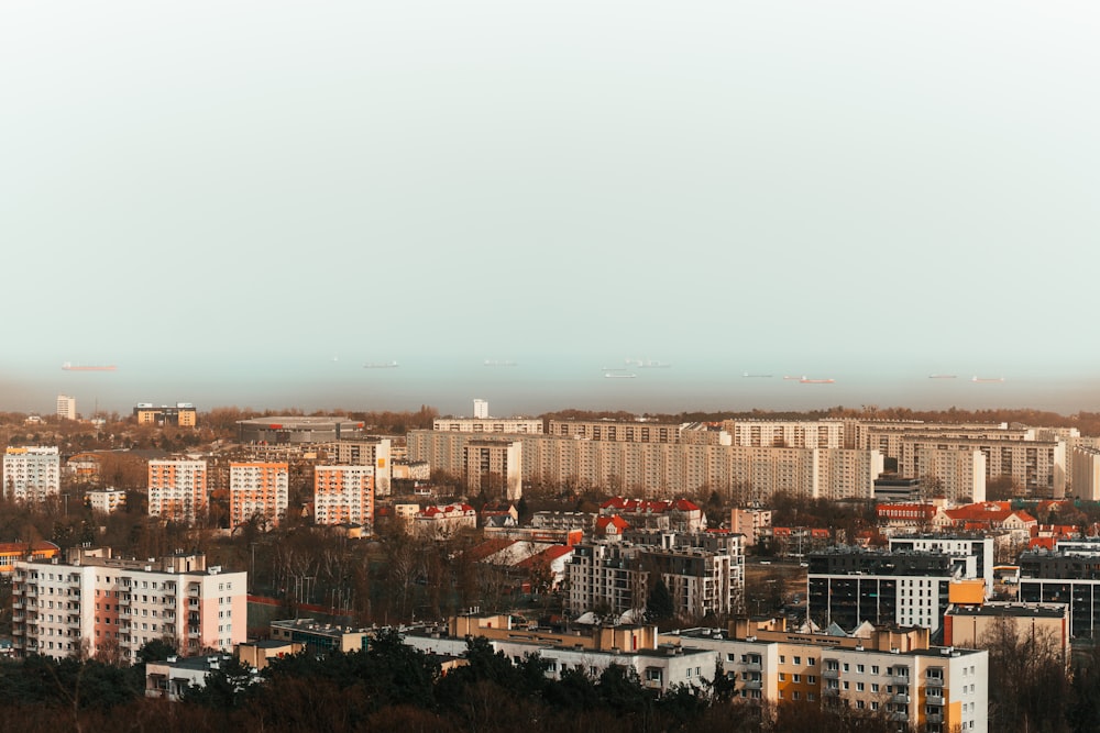 a city with lots of tall buildings and lots of trees