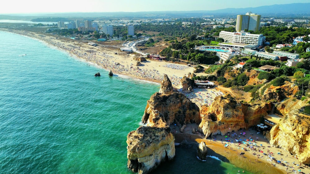 an aerial view of a beach and a city