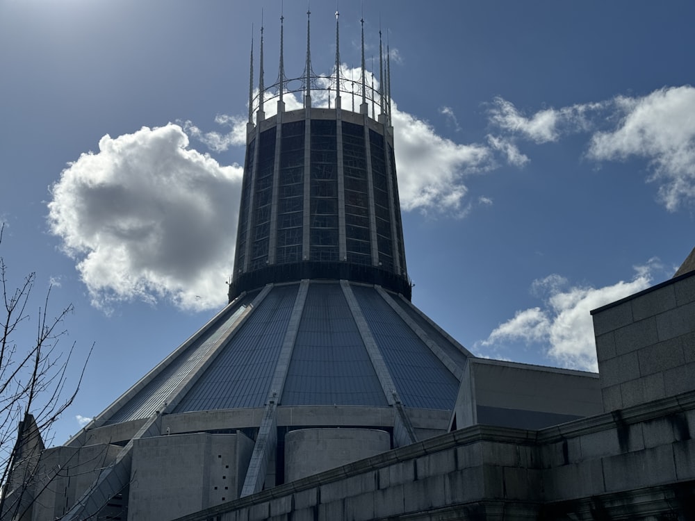 a very tall building with a clock on it's side