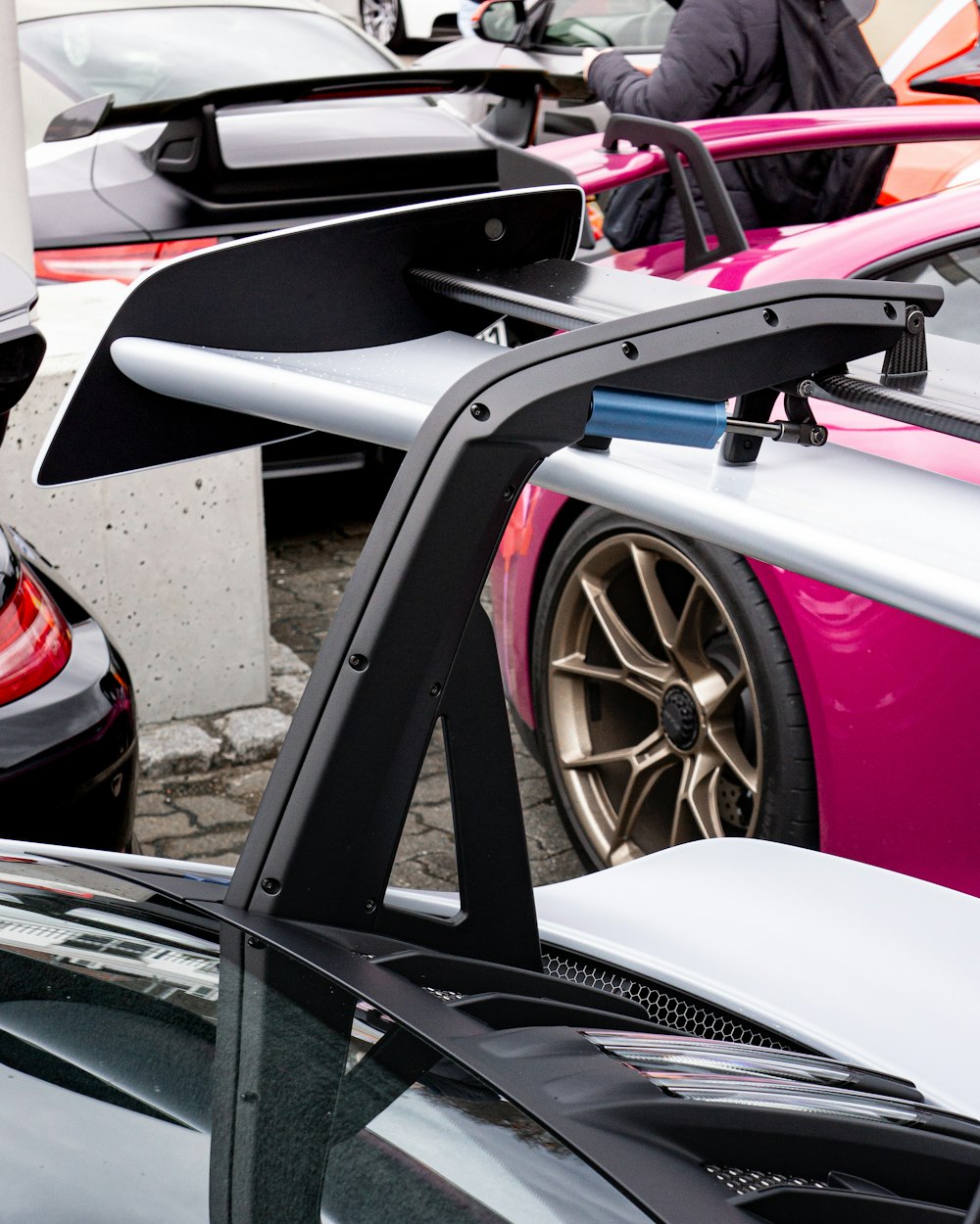 a group of cars parked next to each other