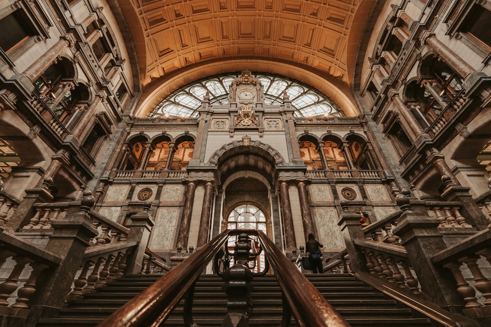 a very large building with a very long stair case