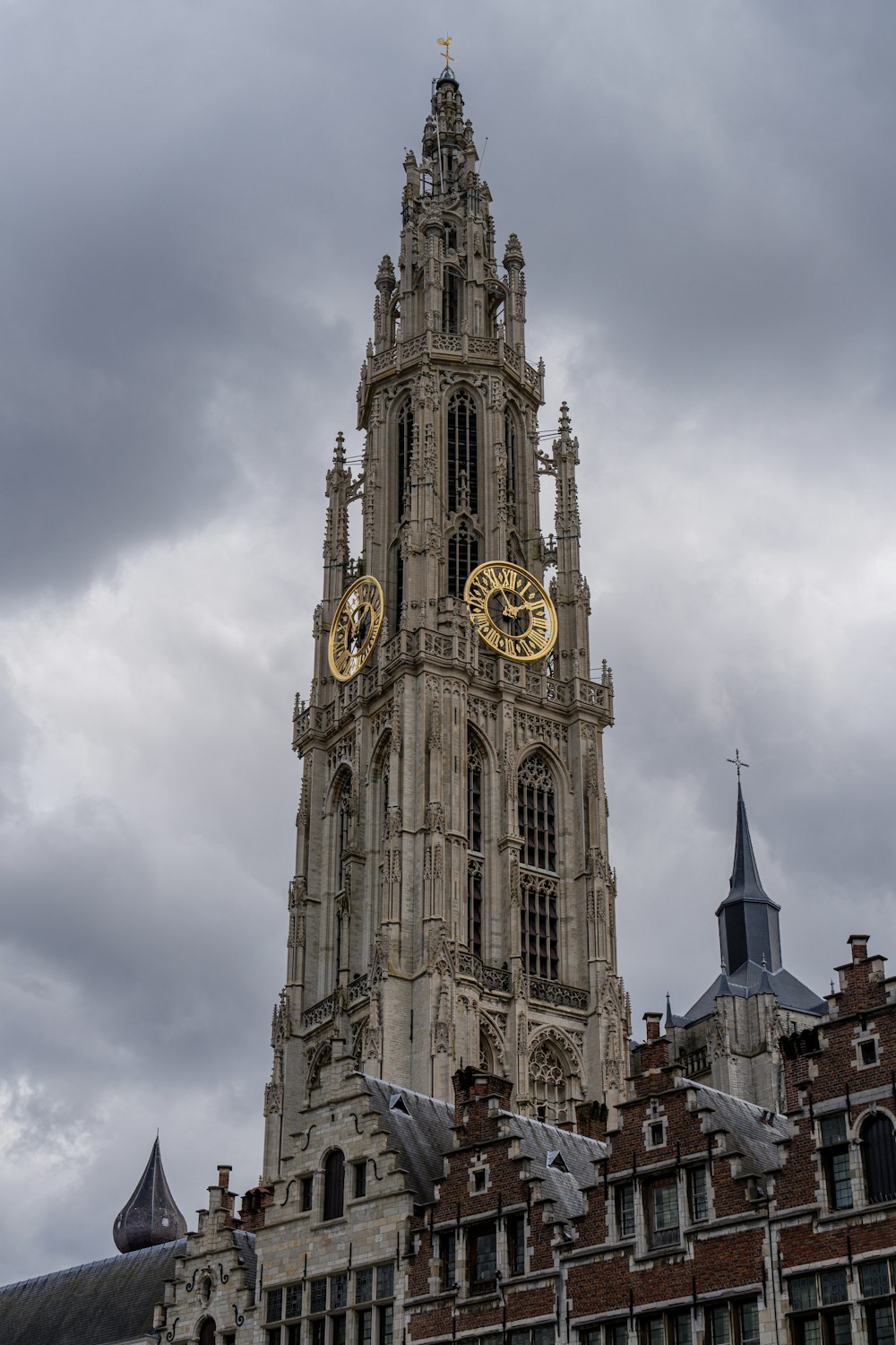 a very tall building with a clock on it's side