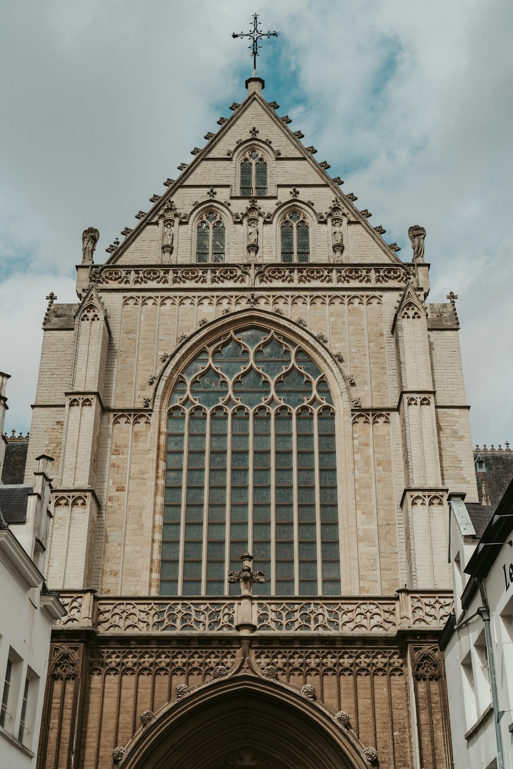 a tall building with a clock on the front of it