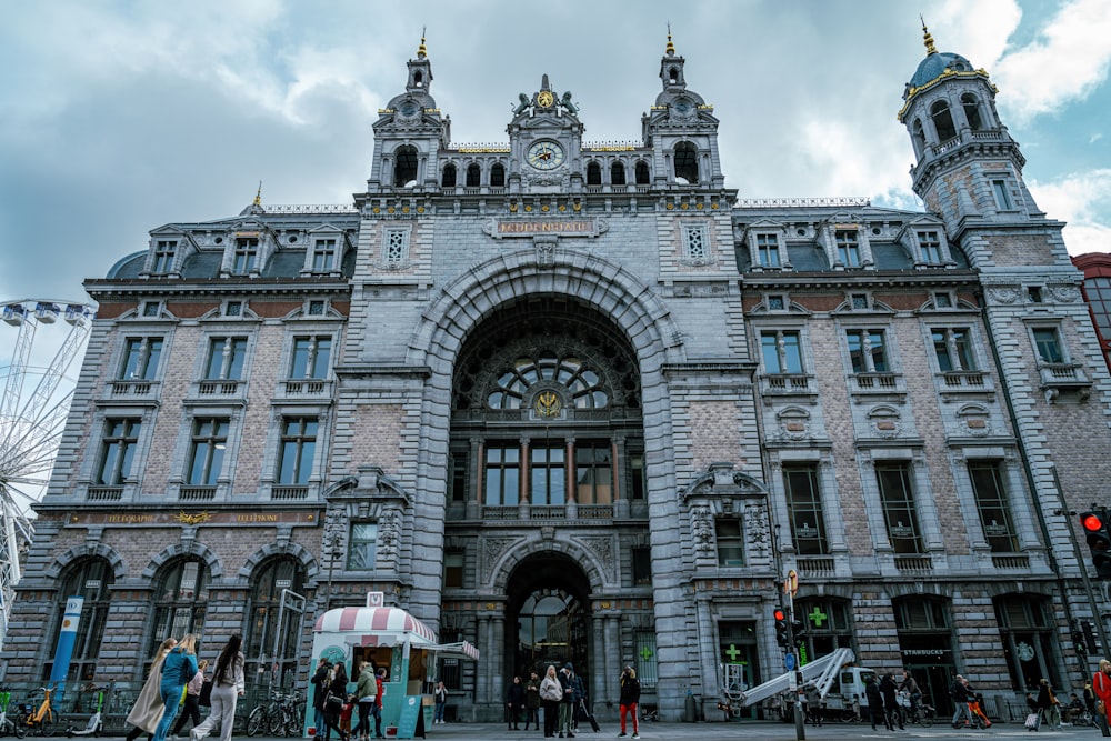 a large building with a clock on the front of it