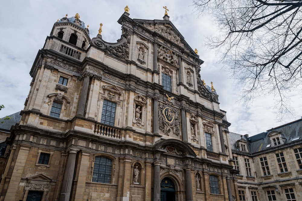 a large building with a clock on the front of it