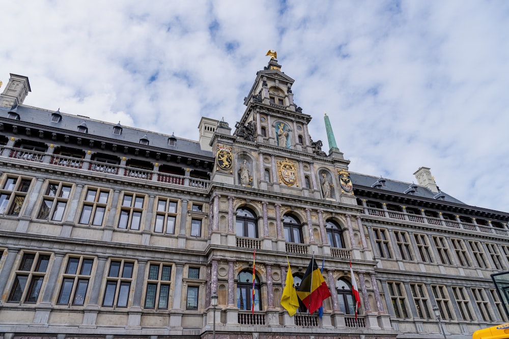 a large building with a clock on the front of it