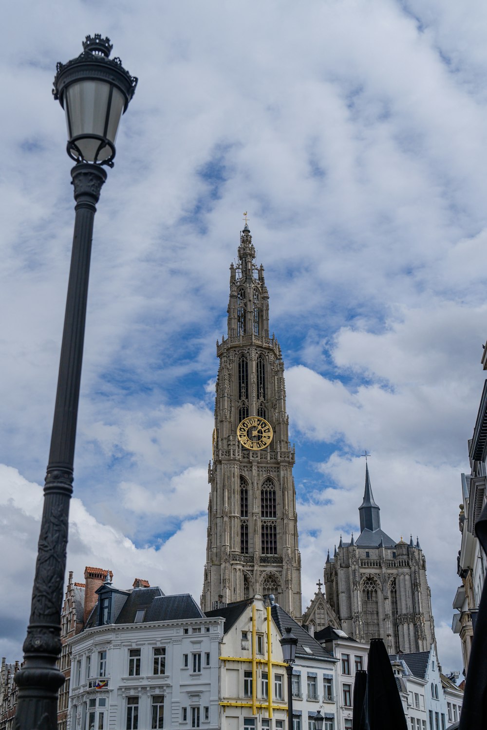 a tall clock tower towering over a city