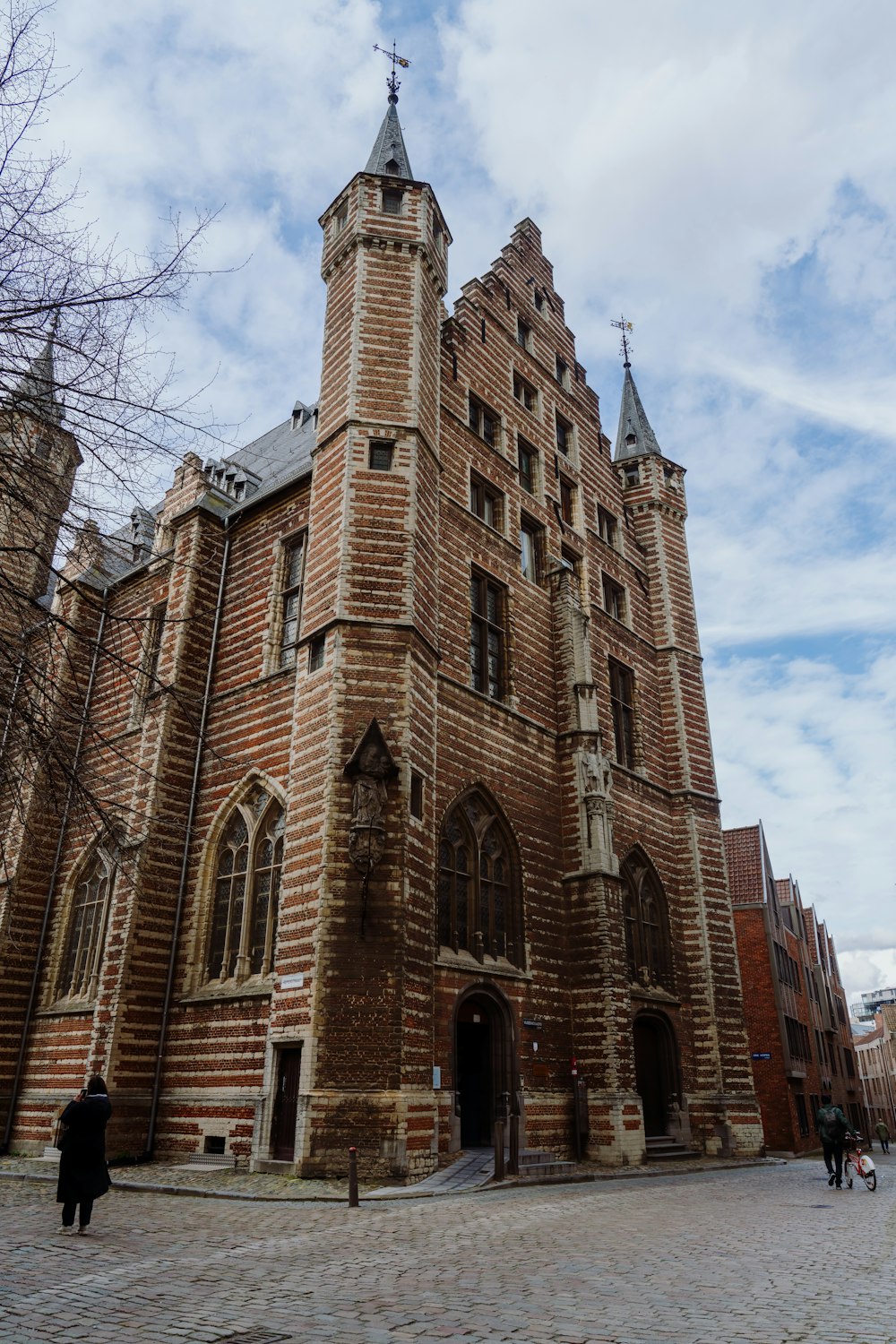 a large brick building with a clock tower