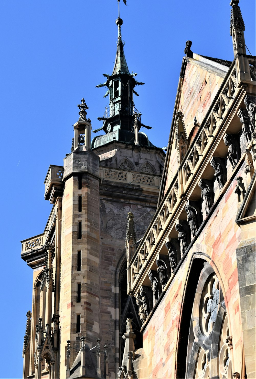 a very tall building with a clock on it's side