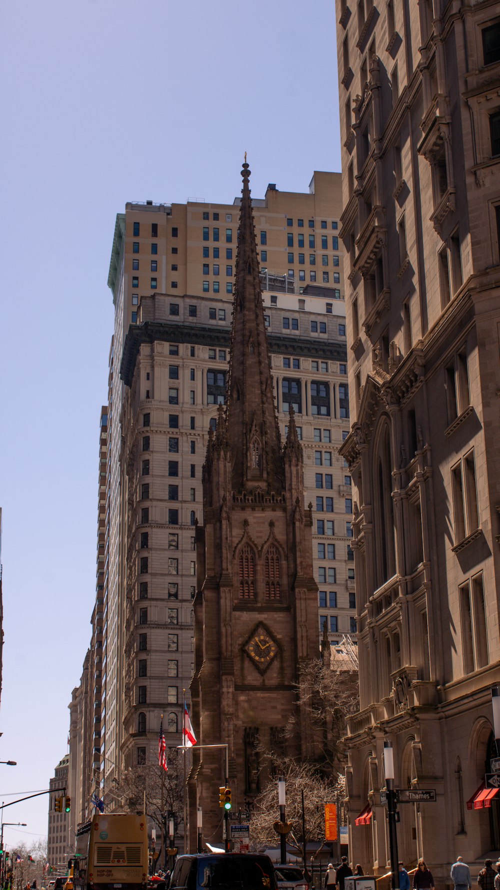 a very tall building with a clock on it's side