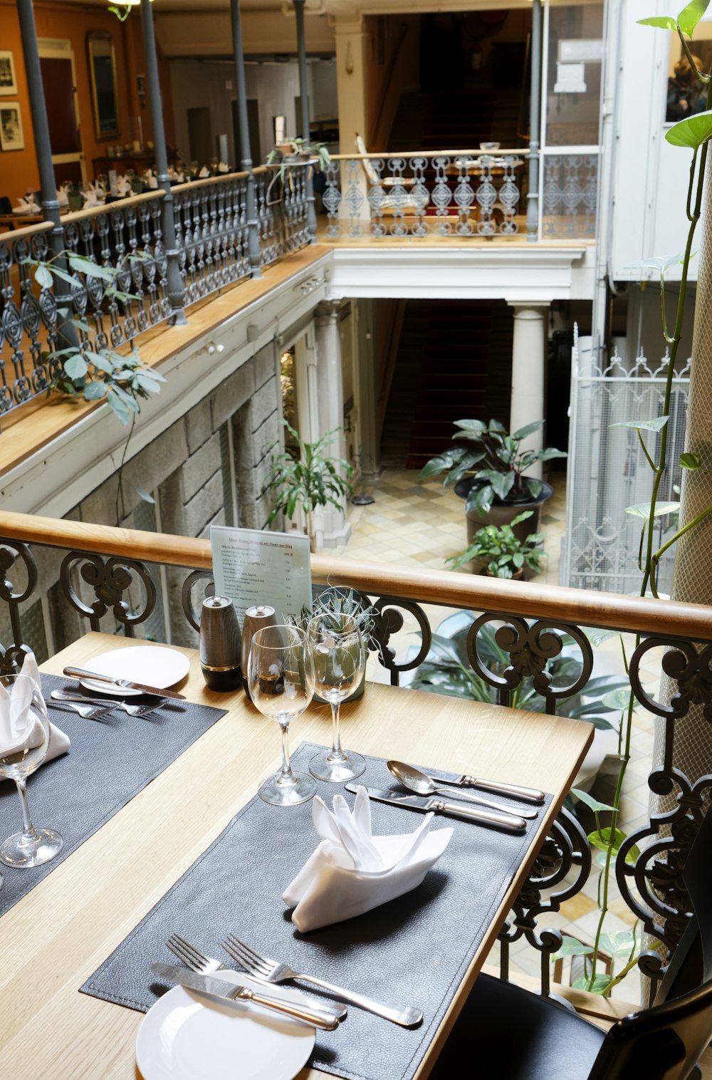 a table with place settings and place settings on it