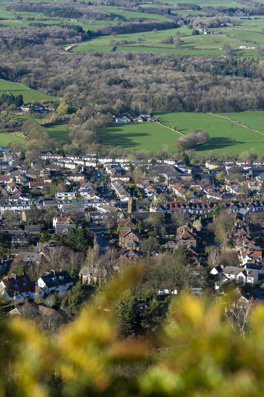 a view of a small town from a hill