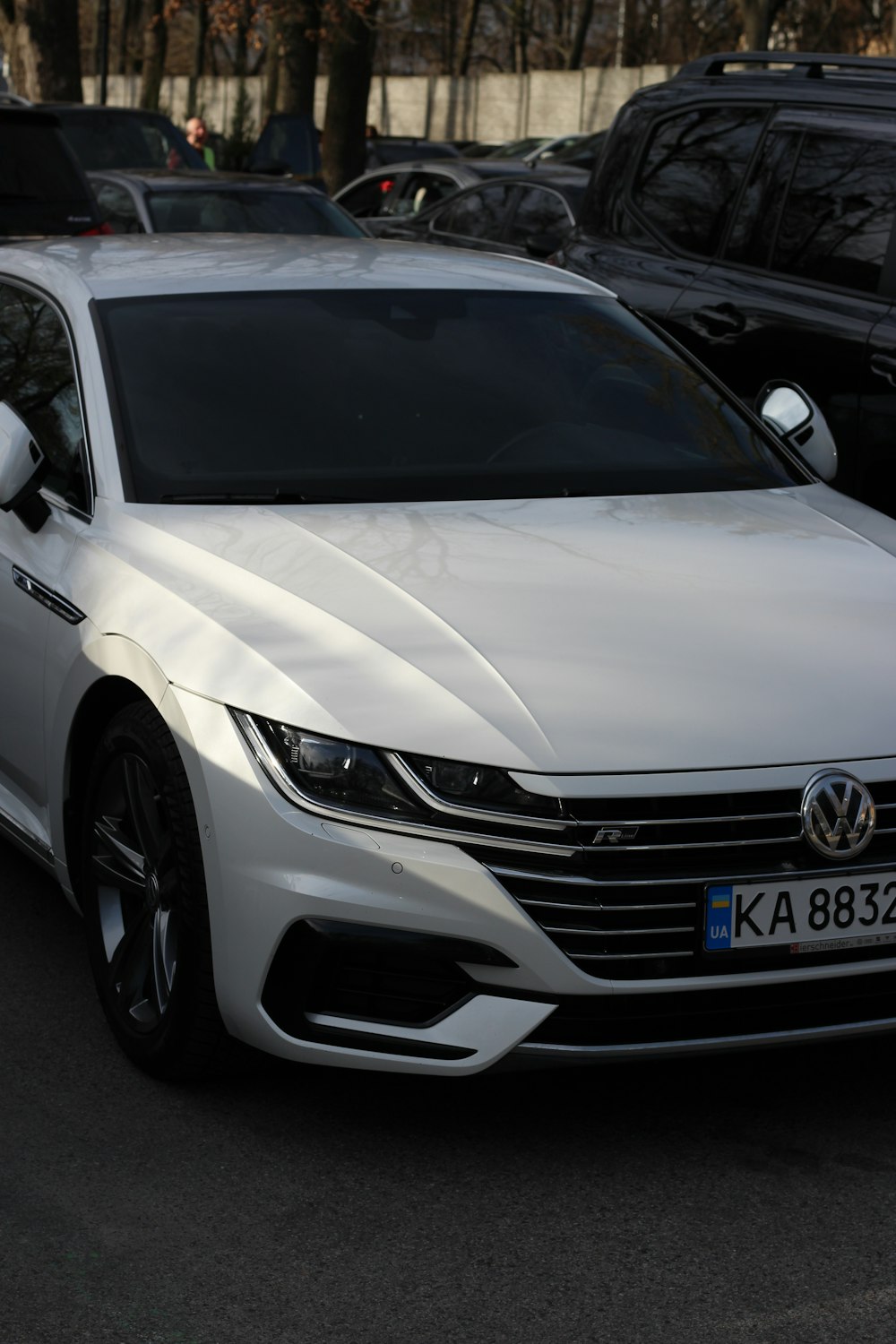 a white car parked in a parking lot