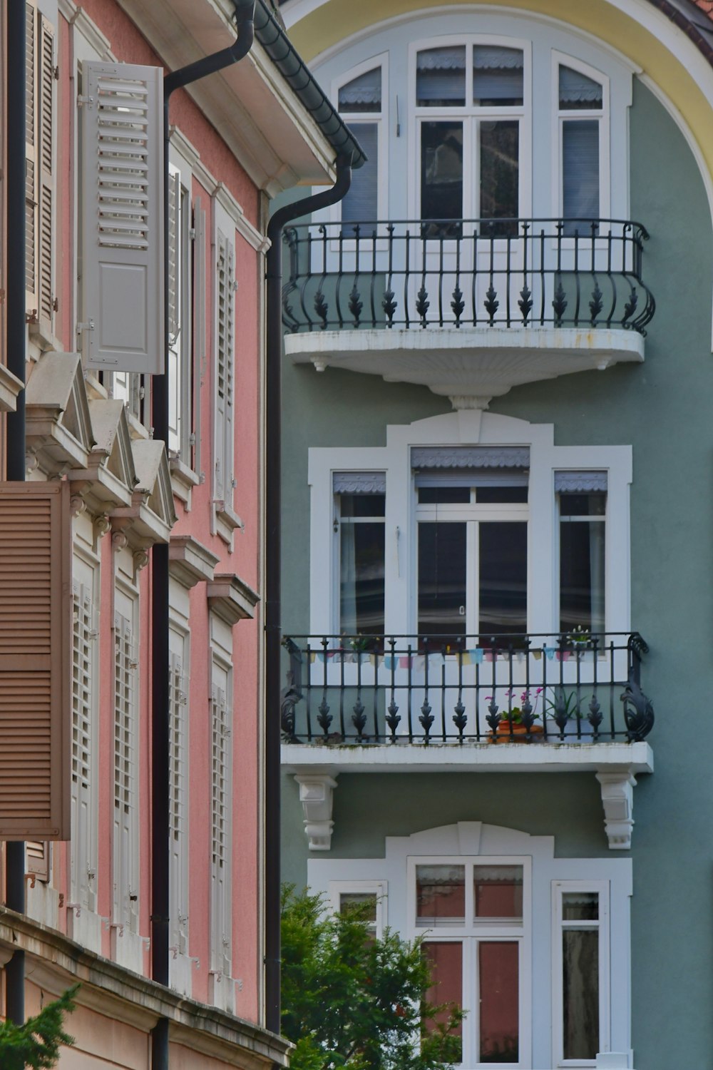 a tall building with balconies and balconies on it