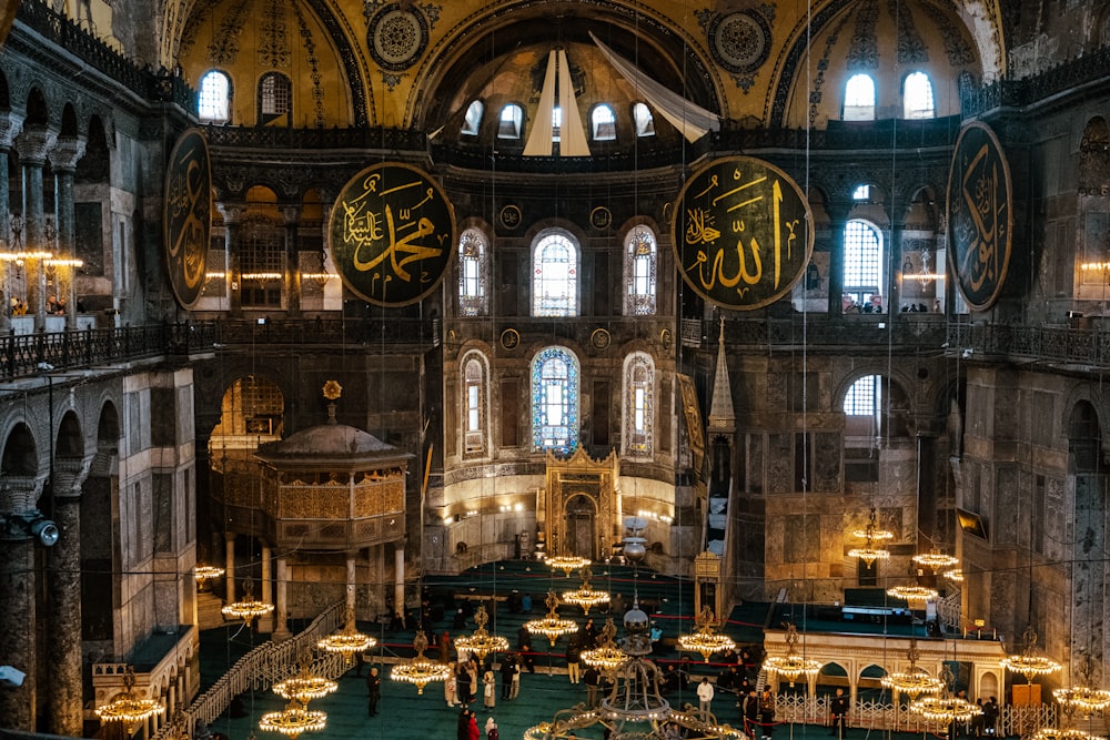 the interior of a large building with a lot of windows