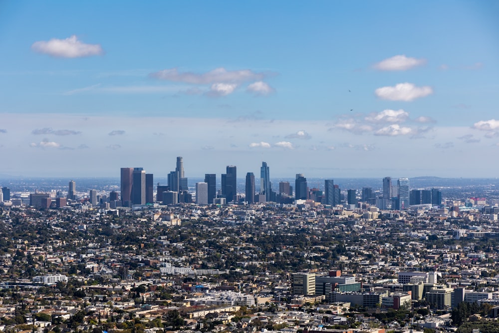 a view of a city from the top of a hill