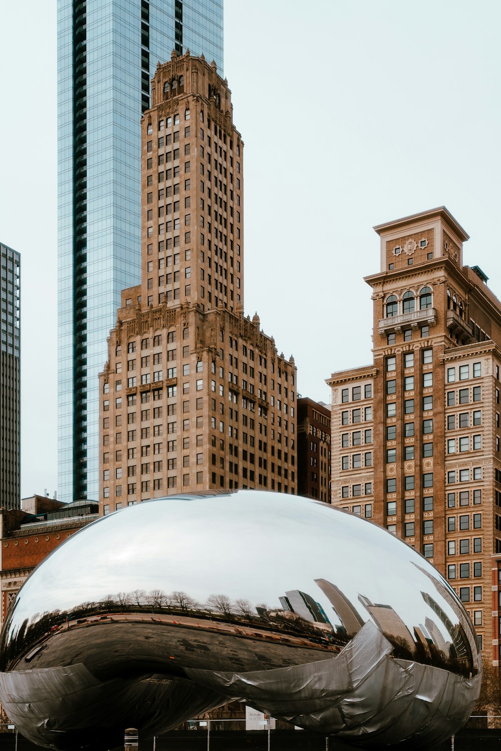 a large shiny object in the middle of a city