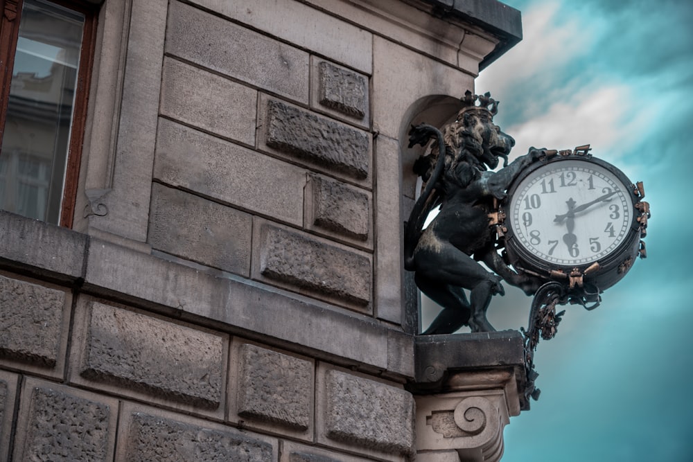 a clock that is on the side of a building
