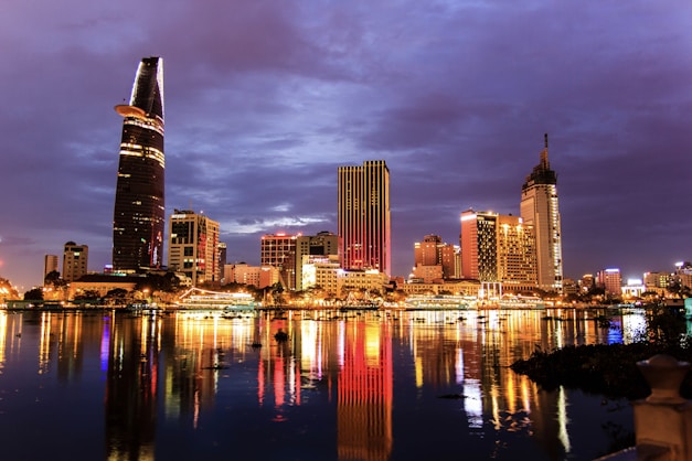 a view of a city at night from across the water