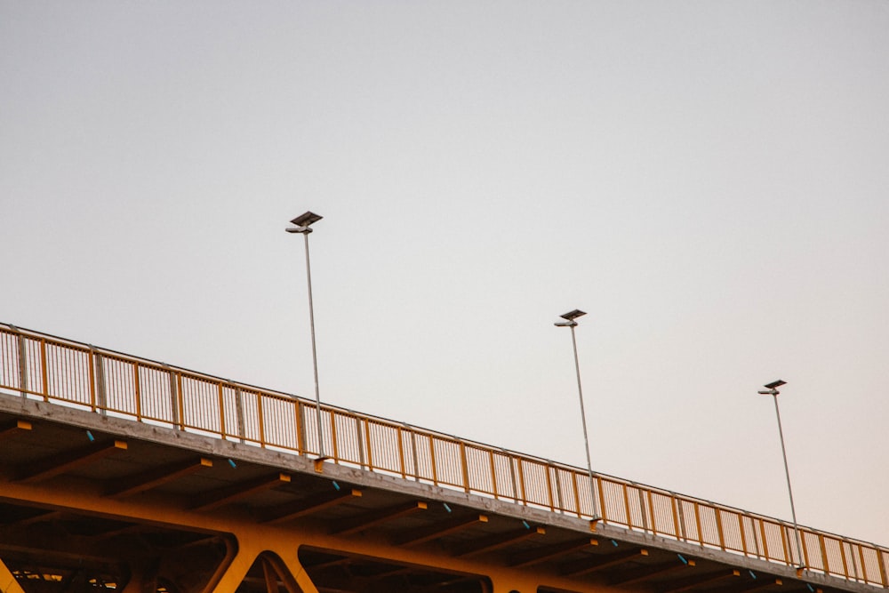 a bridge that has some lights on top of it