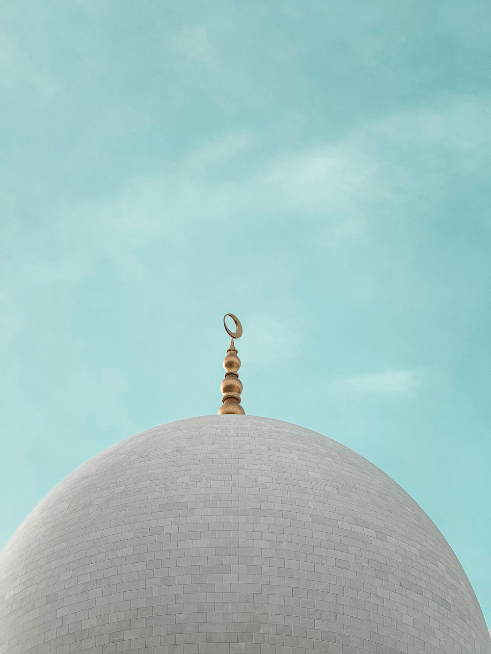 a round building with a sky background