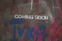 a wall that has some writing on it