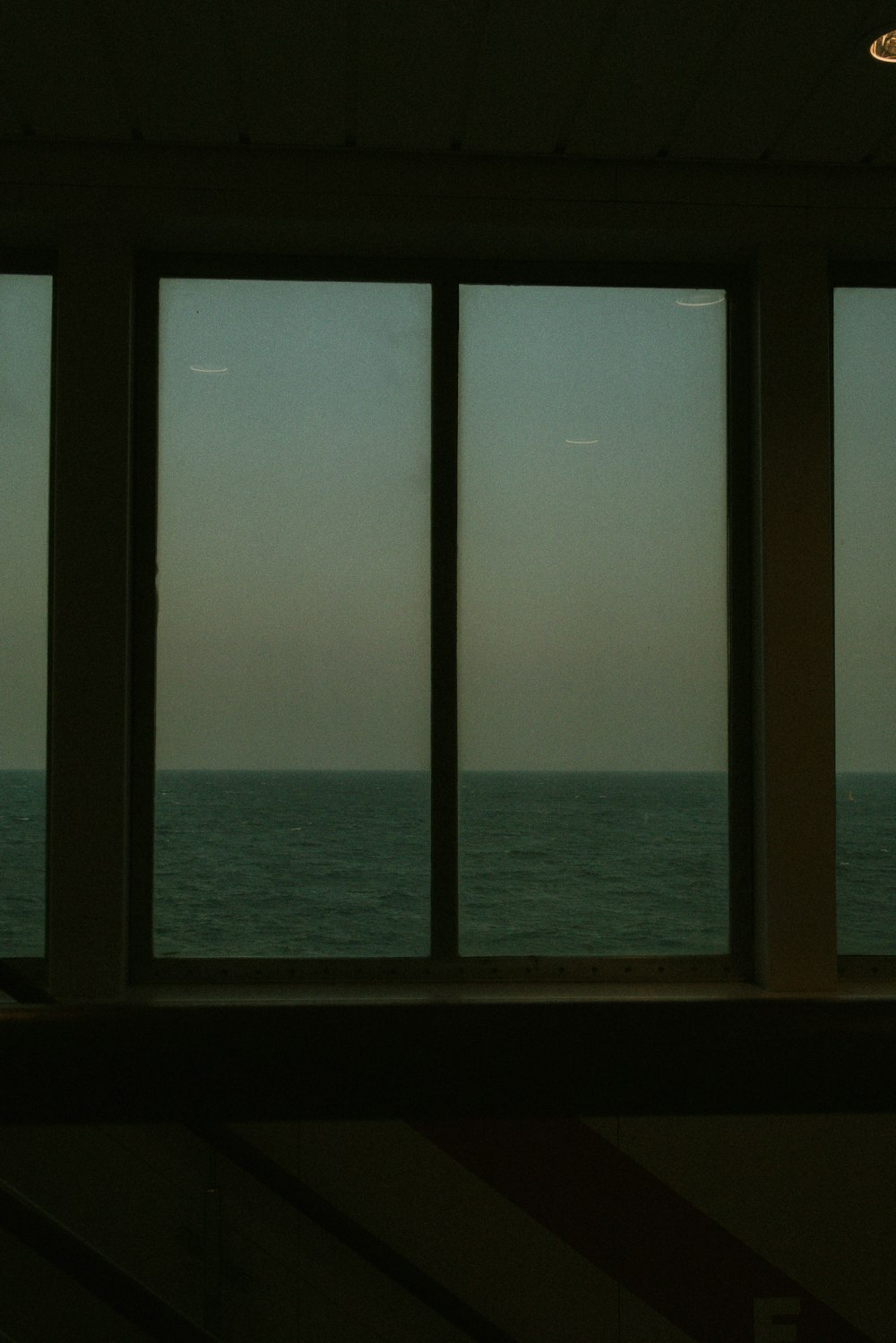 a view of the ocean out of a window