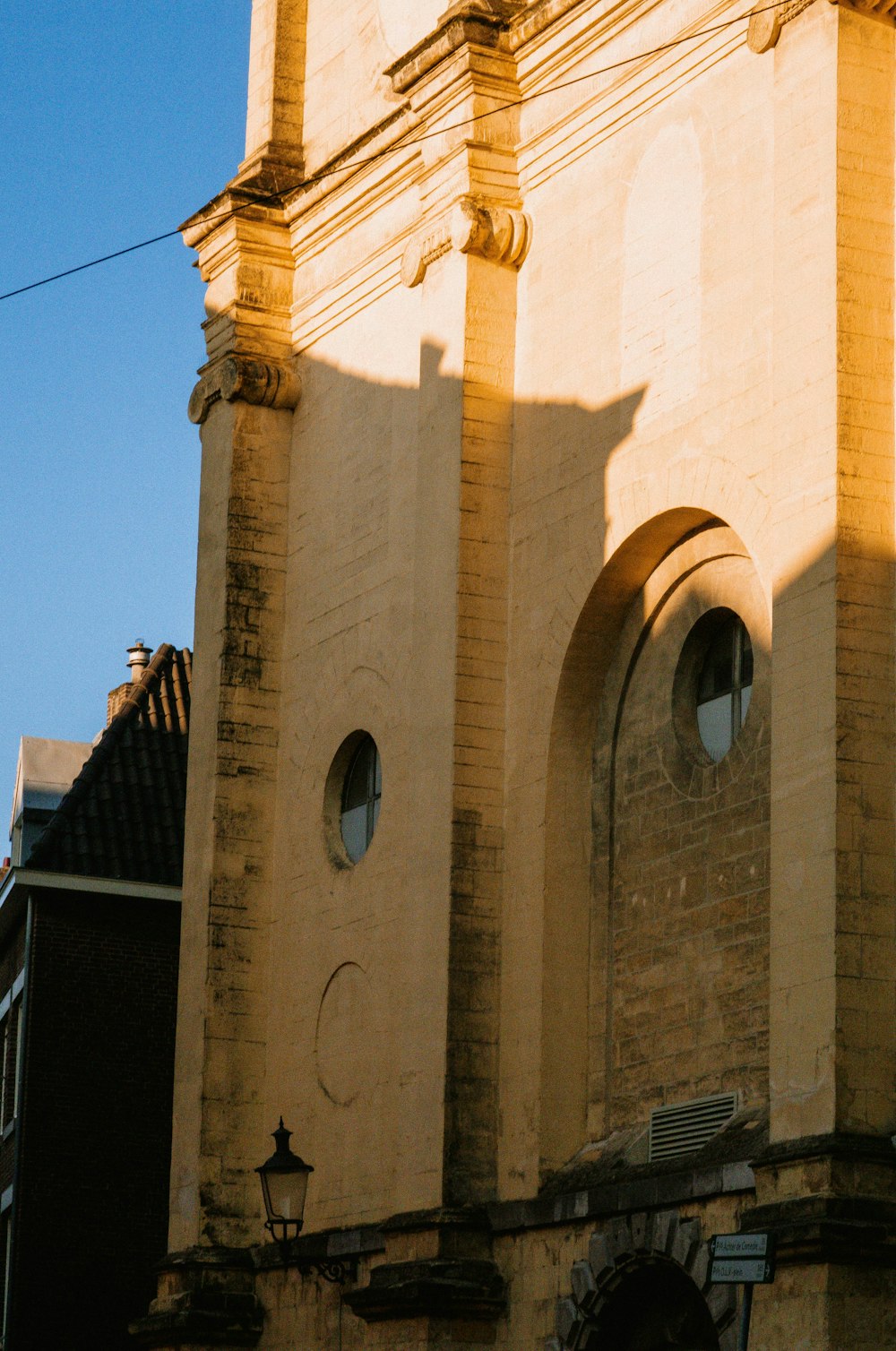 a tall building with a clock on the front of it