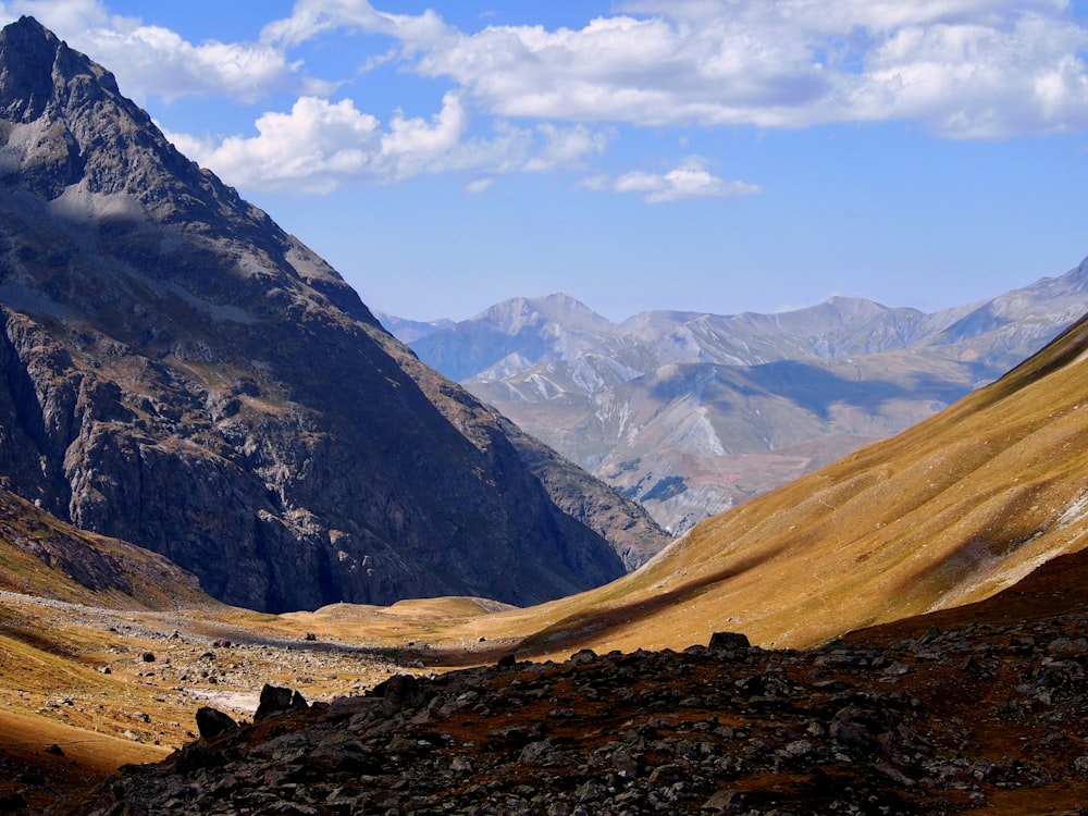 a view of a mountain range in the mountains