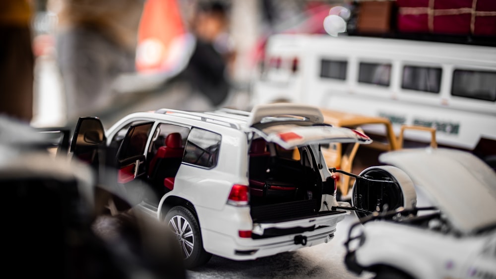 a group of toy cars sitting on top of a table