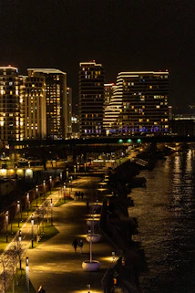 a view of a city at night from across the water