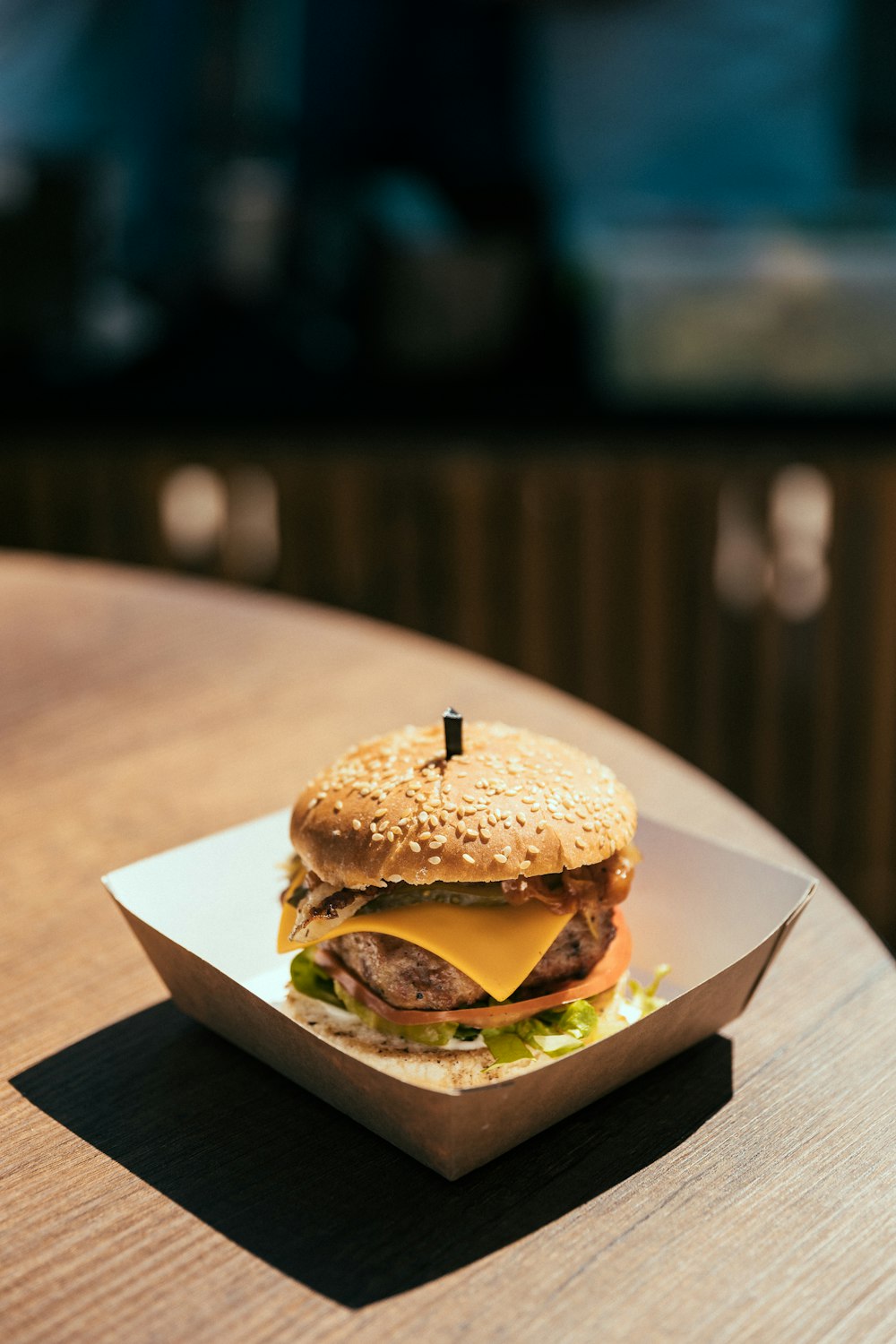 a hamburger sitting on top of a table